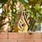 Glitzhome® 9.5" Yellow Distressed Wood Birdhouse with Leaves